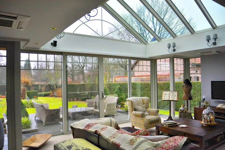 A winter garden with an aluminium structure and a glazed roof